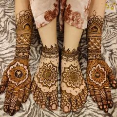 A complete set of matching mandala designs for both hands and feet. This creates a beautifully cohesive and traditional look.