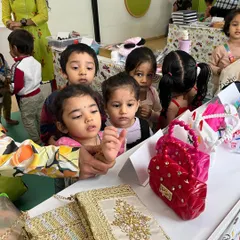 We prepare children for the real world with essential life skills. This gallery shows our Market Day, where kids learn about shopping and transactions, and important workshops on dental hygiene and personal safety, all taught in an engaging, age-appropriate manner.