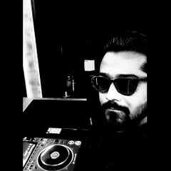 Nothing is as perfect as black and white. A selfie from the DJ booth, capturing the mood of a Friday night.