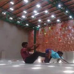 Partner yoga is a wonderful tool for connection and support. In this pose, we work together to find balance and length, creating a shared experience that deepens the practice for both individuals.