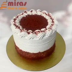 My classic red velvet cake is a crowd-pleaser. It features a moist, velvety crumb and is generously layered with smooth, tangy cream cheese frosting, finished with simple and elegant piping.