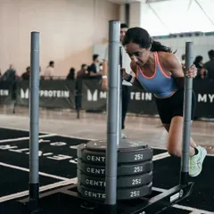 This is what "Strong > Skinny" looks like in action. My coaching focuses on progressive overload with strength workouts like this sled push. We build muscle to boost your metabolism, so you look toned and feel powerful, not just smaller.