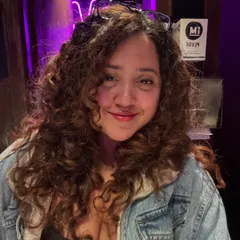 A happy client selfie after her appointment. She was so thrilled with her routine and how good her curls looked.
