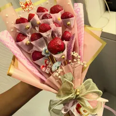 A closer look at the details of my custom strawberry bouquet. Each berry is individually wrapped and arranged to create a stunning visual, making it a perfect Valentine's Day or anniversary surprise.
