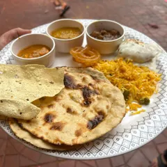 This is your plate at an event catered by me. I specialize in creating lavish North Indian and Continental buffet spreads that are packed with flavor. This plate features Veg Biryani, Dal Makhani, Paneer, Roti, and all the fixings for a truly satisfying meal.