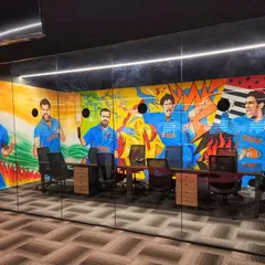 We created this epic mural for the Crictracker office conference room, featuring legendary Indian cricketers. The artwork is visible through the glass walls, making the room a central feature of the office.