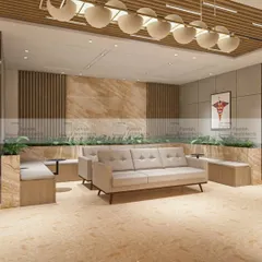 The waiting lounge in a healthcare facility, designed with comfortable seating and integrated planters. The use of natural materials and biophilic design helps reduce stress and create a serene environment.