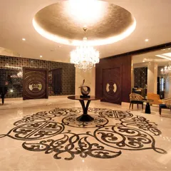 A lobby is the first impression of a building, and it needs to make a statement. In the Bellevue lobby, I used a bold, intricate marble inlay on the floor and a massive, ornate mirror to create a sense of opulence and grandeur. It’s a space designed to feel luxurious from the moment you step inside.