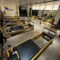 Welcome to our space. We've designed our studio to be a clean, modern, and inspiring environment, fully equipped with top-of-the-line Pilates Reformers and TRX systems to support your wellness journey.