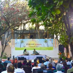 A view of one of our 'Positive Weekends' concerts, held in a beautiful green space. We are committed to creating events that are not only musically enriching but also promote sensitivity towards the environment.
