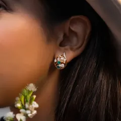 A close-up of the Aranya earring, where nature meets structure. The piece is understated, intentional, and effortlessly striking.