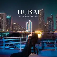 Your pre-wedding shoot deserves a touch of glamour. This couple looks incredible against the Dubai skyline at night. My black trail gown adds the perfect amount of drama and sophistication for a modern, urban pre-wedding photoshoot. I can ship my outfits anywhere you need them.