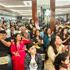 The best view is always a happy, engaged audience. This photo from a Sangeet ceremony captures the joy and energy of the family and friends, which is what I always aim to create.