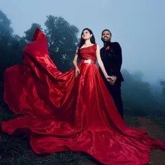 For dramatic pre-wedding photoshoots like this one in the misty hills of Chikmagalur, the makeup needs to be both beautiful and resilient. I designed a look that enhanced her features and paired beautifully with this magnificent red gown, ensuring she looked flawless throughout the outdoor shoot.