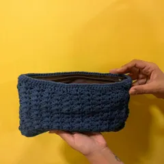 I love reinventing old things. I upcycled an old clutch by giving it a new crochet cover with a beautiful tulip stitch design. It feels brand new again.