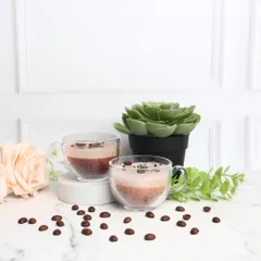 Your daily dose of caffeine, in candle form. My coffee-scented candles look and smell like a real cup of coffee, complete with coffee bean toppings. They are perfect for creating a cozy cafe vibe at home.