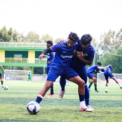 The intensity of a training match. Our players battle for possession, sharpening their skills and physical strength in preparation for the Super Division season.