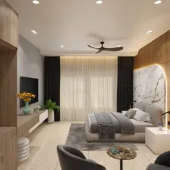 This wide view shows the complete hotel room layout, including a comfortable seating nook. The design cohesively integrates the sleeping area, a media unit, and a small lounge space using a consistent palette of wood and neutral tones.