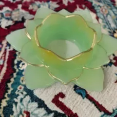 For a more classic look, I created this lotus-shaped T-light holder in a soft green resin with hand-painted gold rims. It’s a timeless design that works beautifully for festive decor or as a thoughtful wedding favor.