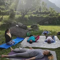 On International Yoga Day, I had the pleasure of guiding new students through a relaxing Savasana (Corpse Pose) in the serene landscape of Dharamkot. Feeling the sun and the earth is a core part of my naturopathic approach to healing.