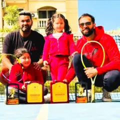 Consistency is key to success on the tour. Here, Kartikeya celebrates his wins from the ITF World Tennis Masters circuit in Kolkata and Jhajjar, where he secured runner-up and winner trophies. We are also pictured with the next generation of champions, who are inspired by his journey.