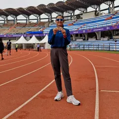 Holding my medal after finishing as the fastest female in the Wipro Bengaluru Half Marathon. Every race is an opportunity to lead and set a new standard for myself.