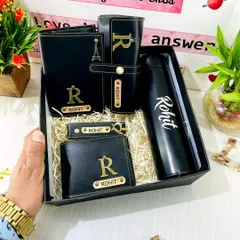 This is my premium, all-in-one men's gift hamper, perfect for birthdays or anniversaries. It includes a personalized temperature bottle, a vegan leather wallet, a matching passport cover, a sunglass holder, and a keychain, all customized with a name and initial.