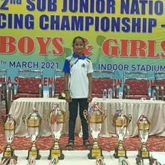 Our student Charvi standing proud with the trophies at the 22nd Sub-Junior National Fencing Championship. She brought home a Gold in the individual Foil event and a team Bronze.