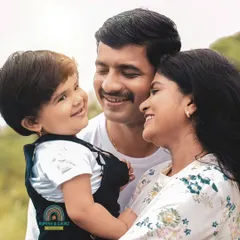 A beautiful, sunlit moment during an outdoor family photoshoot. We use natural light to create warm, authentic portraits that feel as real as the love you share.