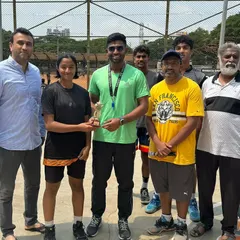 Presenting an award to a dedicated player at the conclusion of our summer camp. My goal is to develop skilled basketball players and build character.