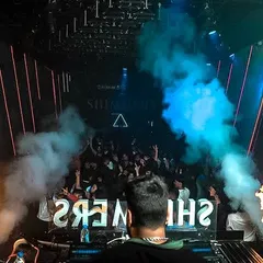 From my perspective on the decks, with fire and CO2 cannons blasting, creating an electrifying atmosphere for the audience.