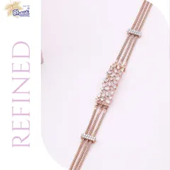 This refined fusion multi-chain bracelet in rose gold is perfect for any moment. A central panel of clustered diamonds connects multiple delicate chains, creating a look that is both modern and timeless.
