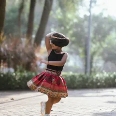 A perfect twirl. I don't ask for poses; I capture the movement, the dance, and the pure joy that comes from a child's spontaneous play.