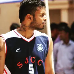 Another photo from my first year playing for St. Joseph's College of Commerce (SJCC). The intensity and focus required in sport are lessons I carry with me today.