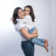 A big hug from a happy daughter. Our studio is a great place to capture the warm, loving bond between a mother and her child in a clean, focused setting.