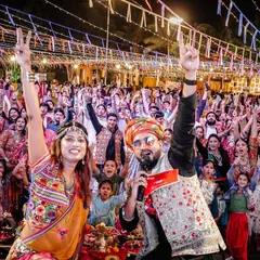 This is the view from my console. A sea of happy faces, hands in the air, completely lost in the music at a massive Raas Garba event in Ahmednagar. My goal is simple: to get every single person on their feet and create a shared moment of pure joy.