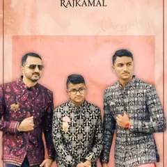 A group of clients styling a wedding collection of the moment. The man on the left wears a modern printed jacket with a pink kurta, showcasing a vibrant festive look.