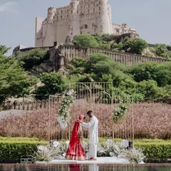 A moment of pure royalty. For this wedding at Alila Fort Bishangarh, I ensured the grandeur of the location was matched by the intimacy of the ceremony, creating a timeless memory against a historic backdrop.
