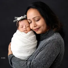 The tender connection between a mother and her newborn is a moment of pure magic. I love creating these quiet, intimate portraits that you will cherish forever.