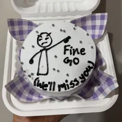 A funny farewell bento cake with a stick figure design. I can create humorous and quirky designs for any occasion.