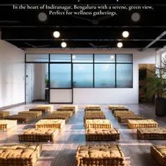 As a consciously curated space, Uruvana offers a serene, green view that feels like an escape from the city. This setup with floor cushions is ideal for meditation sessions, sharing circles, and other wellness gatherings where connection and grounding are key.