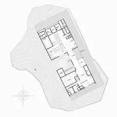 The floor plan for the community hall. The layout separates public gathering spaces from the private guest house areas, with the courtyard acting as a functional and social hub connecting the two.