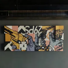 A straight-on view of the finished multi-canvas installation for Lounge29 in Mysore. The pop art design, featuring guns and graphic elements, creates a really cool, edgy vibe for the space.
