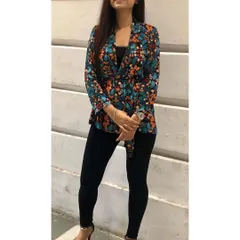 My custom-designed floral top paired with black leggings is a great example of a smart-casual look. It's comfortable enough for a day of meetings but stylish enough for an evening dinner.