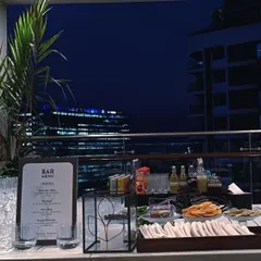 This is a sleek mobile bar I set up for a corporate event on a rooftop. The setup includes my professional bartenders, a full range of spirits, and custom printed menus to give your event a polished feel.
