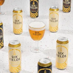 A bright and clean pattern shot for Six Fields, showcasing both their can designs in a way that is perfect for promotional materials and social media.