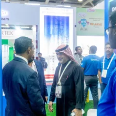 Our team engaging with a visitor from the Middle East at ELECRAMA 2025. These global interactions are vital for understanding diverse market needs and showcasing how our solutions can be adapted for different regions.
