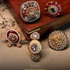 Statement Sparkle. A collection of our boldest rings, featuring navratna designs, floral motifs, and large uncut polki diamonds, each one a monumental presence.