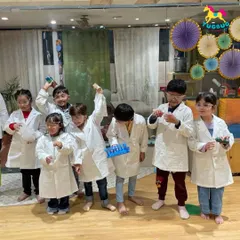 Our team of little scientists is ready for action! Dressed in lab coats, they are excited to start their experiments, learning about teamwork and scientific methods along the way.
