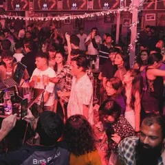 A wide shot of the crowd at Happy Brew, completely engaged in the karaoke night. The energy was fantastic.